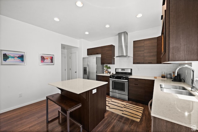 1578 E Maple Way, Layton, UT 84040 - kitchen featuring stainless steel appliances, wall chimney range hood, a kitchen island, dark wood-style flooring, and dark brown cabinets