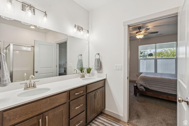 155 N 3830 W, West Point, UT 84015 - full bathroom with ensuite bathroom, double vanity, a ceiling fan, and a shower stall
