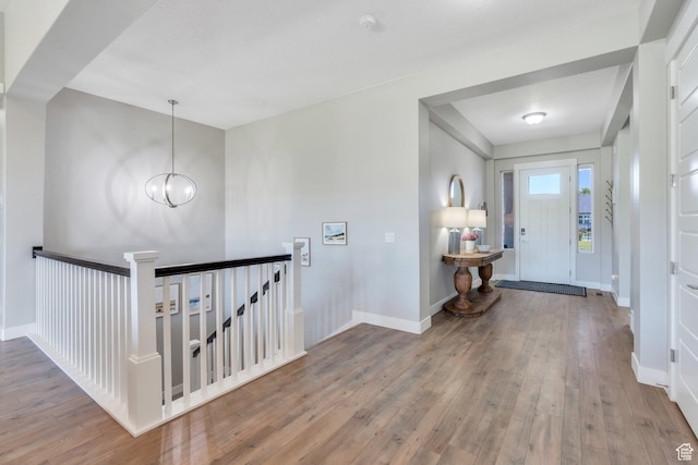586 S Appenzell Ln W Unit 16, Midway, UT 84049 - entryway featuring hardwood / wood-style floors and a chandelier