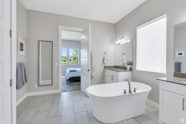 586 S Appenzell Ln W Unit 16, Midway, UT 84049 - ensuite bathroom featuring vanity and a soaking tub
