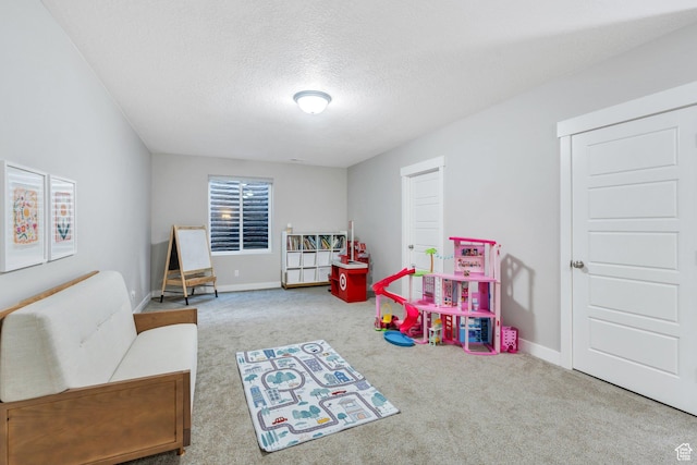 586 S Appenzell Ln W Unit 16, Midway, UT 84049 - recreation room featuring carpet and a textured ceiling
