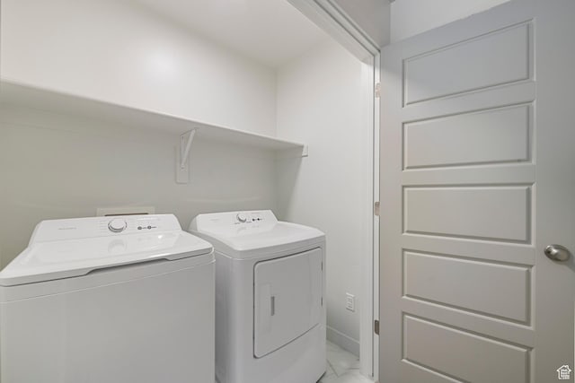 528 S Musk Ave W, Grantsville, UT 84029 - laundry area featuring light marble finish floors and separate washer and dryer