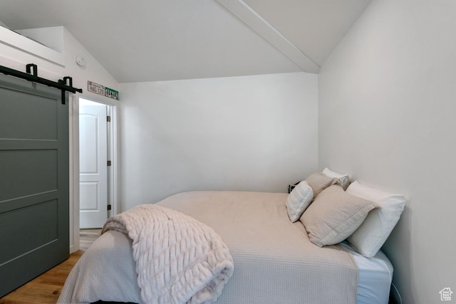 98 W 880 N Unit 6, Provo, UT 84604 - bedroom featuring lofted ceiling and wood finished floors