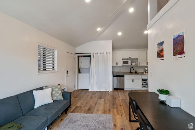 98 W 880 N Unit 6, Provo, UT 84604 - living area with light wood finished floors, vaulted ceiling, and recessed lighting