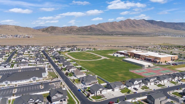 6228 N Boulter Peak Ln, Eagle Mountain, UT 84005 - aerial perspective of suburban area with a mountain backdrop