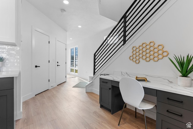 78 Watson Dr, Saratoga Springs, UT 84045 - office space with built in desk, light wood finished floors, and recessed lighting
