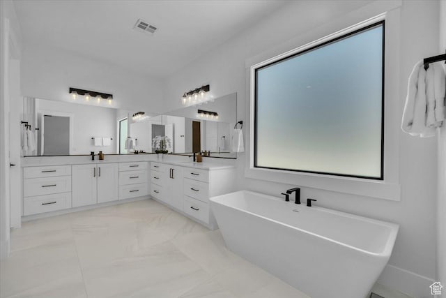 529 E 4290 S, Washington, UT 84780 - full bathroom featuring a soaking tub, vanity, and marble finish floors