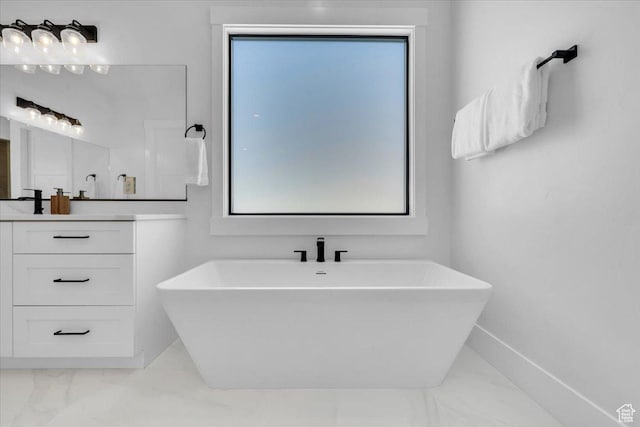 529 E 4290 S, Washington, UT 84780 - bathroom with marble look tiles, vanity, and a soaking tub