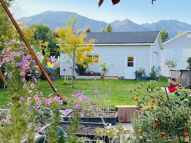 665 S 1040 E, Spanish Fork, UT 84660 - rear view of property with a vegetable garden and a mountain view