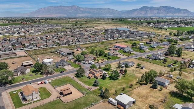 4403 W 3850 S, West Haven, UT 84401 - aerial view of property's location with a mountain backdrop and nearby suburban area