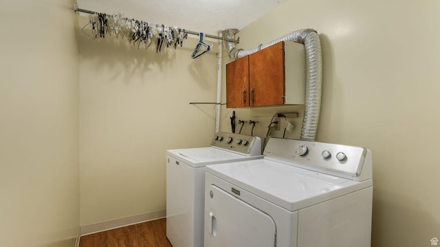 4403 W 3850 S, West Haven, UT 84401 - laundry area with cabinet space, independent washer and dryer, and wood finished floors