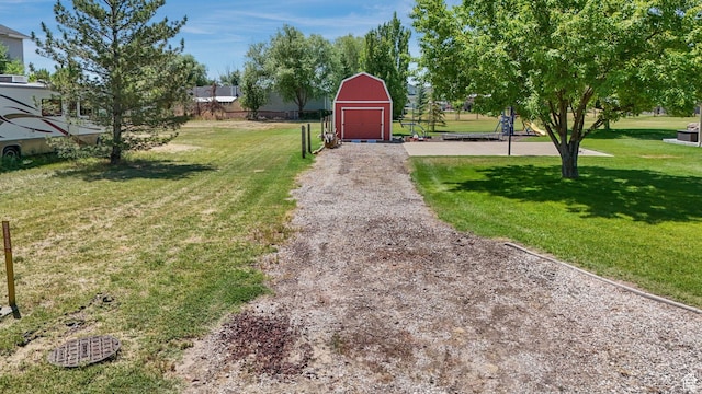 4403 W 3850 S, West Haven, UT 84401 - view of green lawn featuring an outdoor structure and a barn