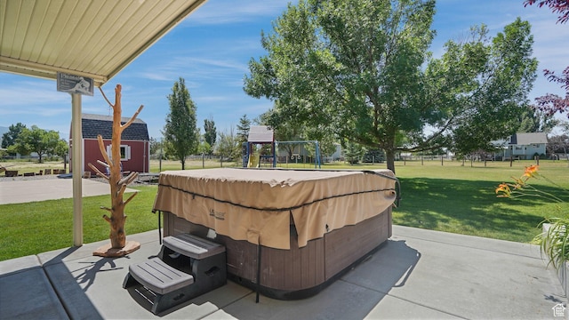 4403 W 3850 S, West Haven, UT 84401 - view of patio / terrace with a hot tub and a playground