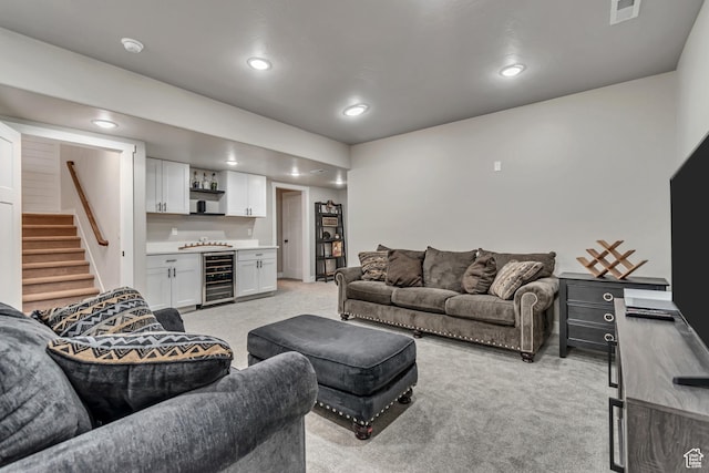 992 W Emily Francis Cir S, Jordan, UT 84095 - living room with wine cooler, bar, light colored carpet, stairs, and recessed lighting