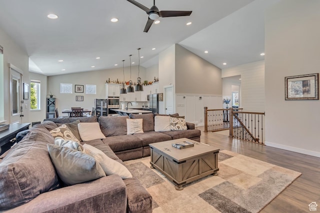 992 W Emily Francis Cir S, Jordan, UT 84095 - living area featuring light wood-style floors, a ceiling fan, high vaulted ceiling, and recessed lighting