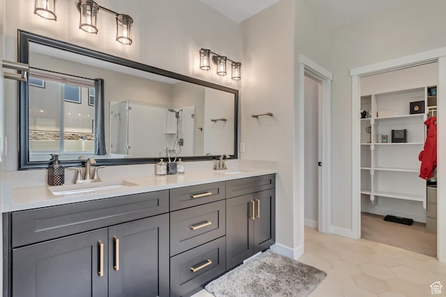 992 W Emily Francis Cir S, Jordan, UT 84095 - full bathroom with double vanity, a shower, and a spacious closet