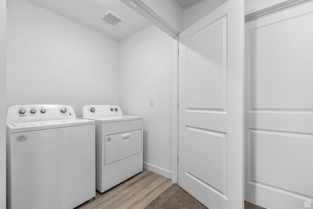 1286 N 375 S Unit 148, Harrisville, UT 84404 - laundry area with independent washer and dryer and light wood-type flooring