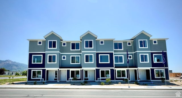 1286 N 375 S Unit 148, Harrisville, UT 84404 - townhome / multi-family property featuring a mountain view and covered porch