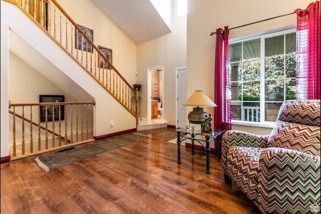 11805 S Sunset Ponds Dr Unit 5, Draper, UT 84020 - sitting room with wood finished floors, a high ceiling, and stairs