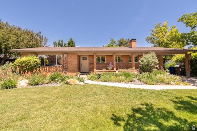 1983 E 1700 S, Salt Lake City, UT 84108 - ranch-style house featuring a front lawn, a chimney, and brick siding