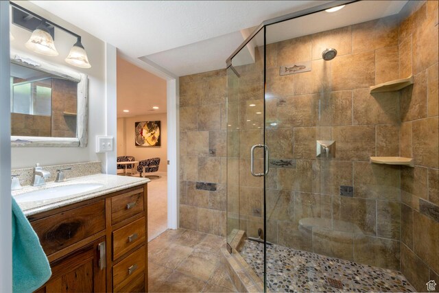 1983 E 1700 S, Salt Lake City, UT 84108 - bathroom featuring a shower stall, vanity, and recessed lighting