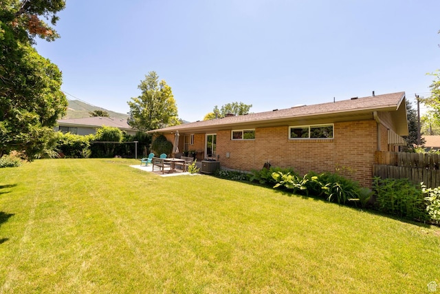 1983 E 1700 S, Salt Lake City, UT 84108 - rear view of property featuring brick siding and a patio