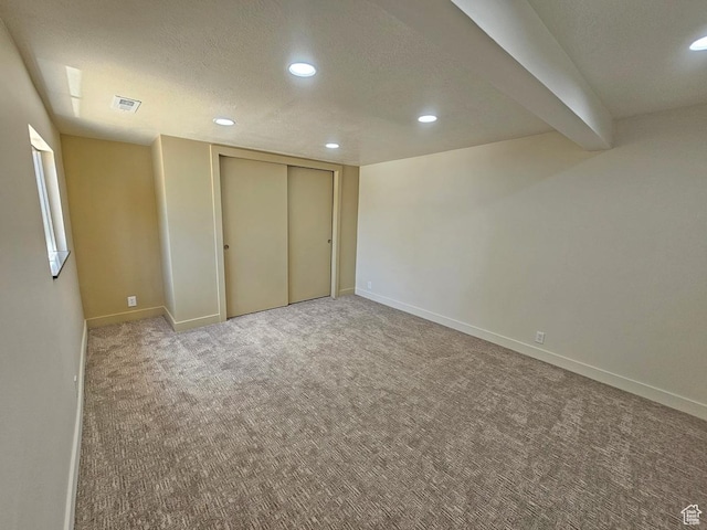 10138 S Peony Way, Sandy, UT 84094 - unfurnished bedroom with carpet flooring, recessed lighting, a textured ceiling, and a closet