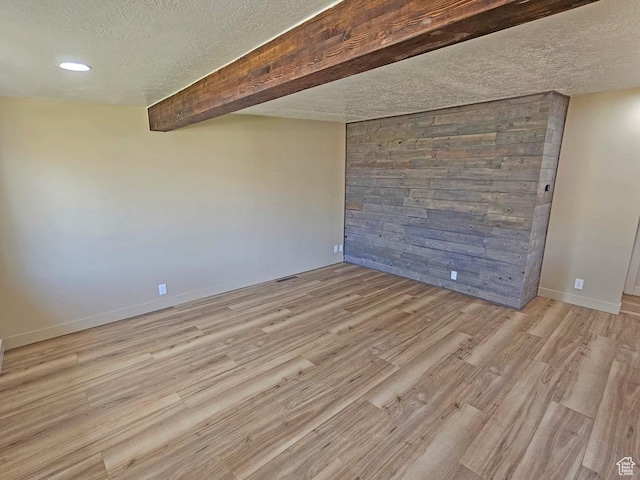 10138 S Peony Way, Sandy, UT 84094 - empty room featuring a textured ceiling, light wood-style flooring, and recessed lighting