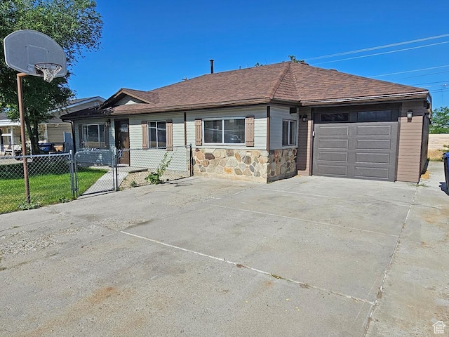10138 S Peony Way, Sandy, UT 84094 - single story home with driveway, a garage, stone siding, a shingled roof, and a gate
