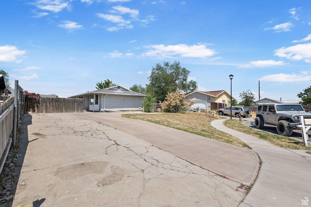 3148 S Old Glory Cir W, Magna, UT 84044 - view of front of house featuring concrete driveway
