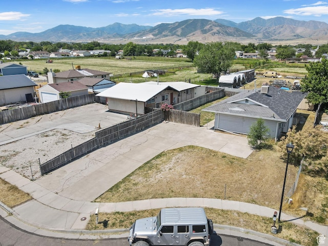 3148 S Old Glory Cir W, Magna, UT 84044 - aerial perspective of suburban area featuring a mountain backdrop