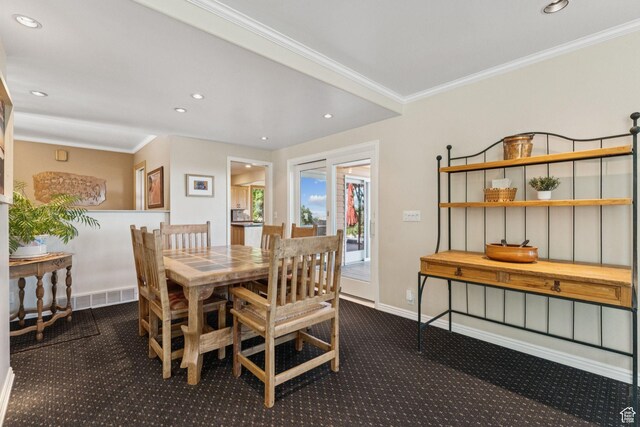 4714 S Idlewild Rd, Millcreek, UT 84124 - dining area with carpet floors, ornamental molding, and recessed lighting