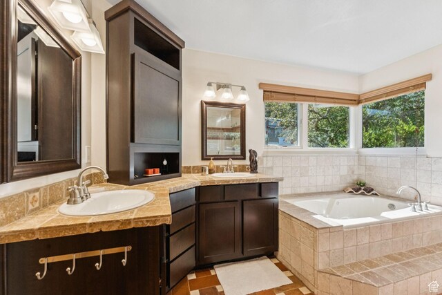 4714 S Idlewild Rd, Millcreek, UT 84124 - bathroom with double vanity and a garden tub