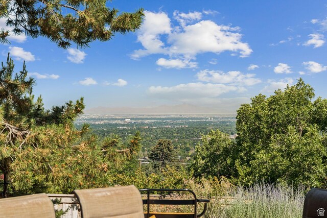 4714 S Idlewild Rd, Millcreek, UT 84124 - view of patio / terrace featuring a view of trees