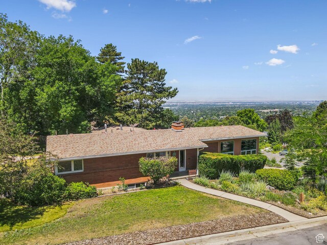 4714 S Idlewild Rd, Millcreek, UT 84124 - ranch-style house featuring a front lawn