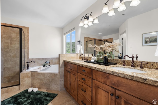 15337 S Eagle Crest Dr E, Draper, UT 84020 - bathroom featuring double vanity, a shower stall, a garden tub, tile patterned floors, and a chandelier