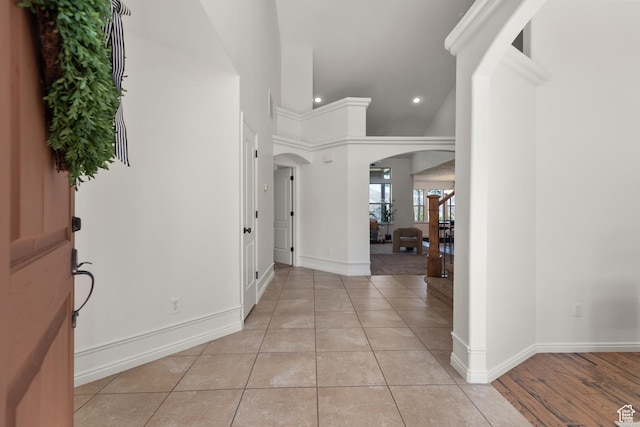 15337 S Eagle Crest Dr E, Draper, UT 84020 - foyer entrance featuring arched walkways, recessed lighting, and light tile patterned flooring