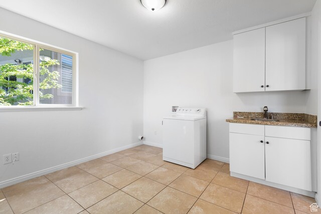 15337 S Eagle Crest Dr E, Draper, UT 84020 - laundry area with washer / dryer, bar with sink, light tile patterned floors, and cabinet space