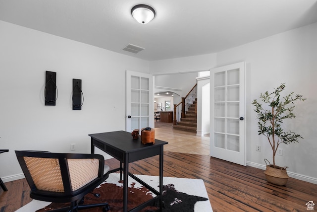 15337 S Eagle Crest Dr E, Draper, UT 84020 - office area featuring french doors, arched walkways, and wood finished floors