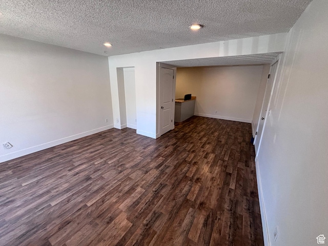 88 W 50 S Unit Q6, Centerville, UT 84014 - below grade area with dark wood finished floors, a textured ceiling, and recessed lighting