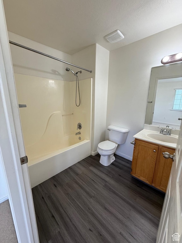 1779 W 1200 S Unit 319, Springville, UT 84663 - full bathroom with vanity, bathing tub / shower combination, wood finished floors, and a textured ceiling
