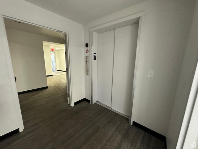404 E 5600 S, Murray, UT 84107 - corridor featuring dark wood-style flooring and elevator