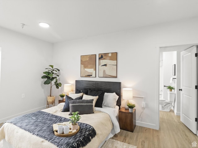 404 E 5600 S, Murray, UT 84107 - bedroom with baseboards and wood finished floors