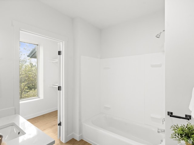 404 E 5600 S, Murray, UT 84107 - bathroom with shower / bath combination, wood finished floors, and vanity