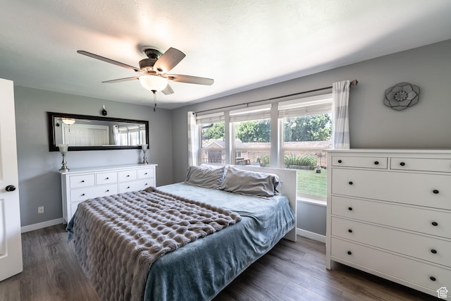 2466 N 1050 W, Clinton, UT 84015 - bedroom with dark wood finished floors and ceiling fan