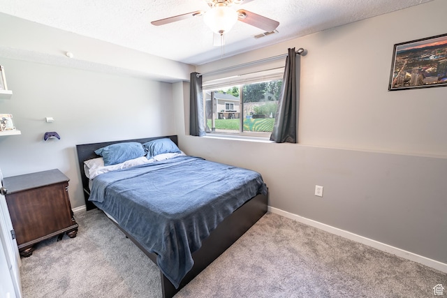 2466 N 1050 W, Clinton, UT 84015 - carpeted bedroom with a ceiling fan and a textured ceiling