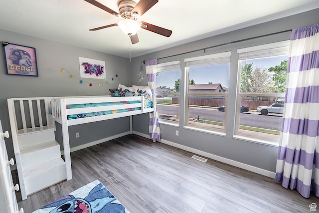 2466 N 1050 W, Clinton, UT 84015 - bedroom featuring wood finished floors and ceiling fan