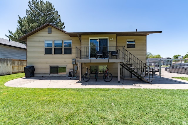 2466 N 1050 W, Clinton, UT 84015 - back of property with a patio area and stairway
