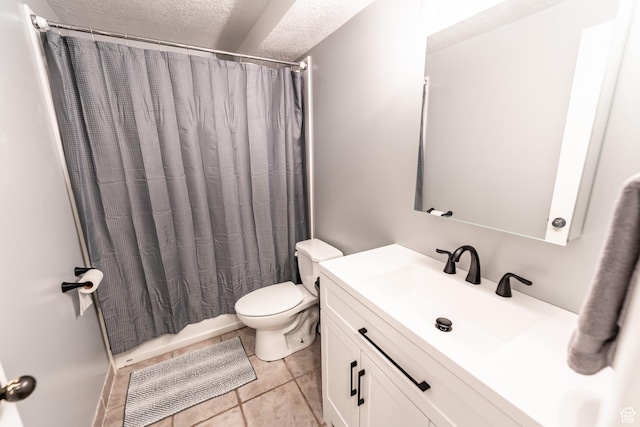 2466 N 1050 W, Clinton, UT 84015 - bathroom with a textured ceiling, vanity, and tile patterned floors