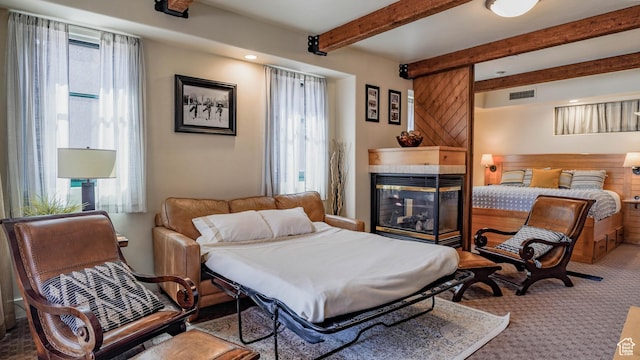 1456 W Newpark Blvd Unit 213, Park City, UT 84098 - carpeted bedroom with a tile fireplace and beam ceiling